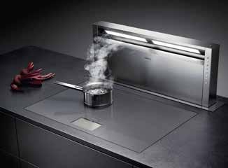It draws the heat, steam and vapours down, at source, before they pervade the atmosphere. Up to two minimalist downdraft ventilations can be controlled with an exquisite control knob.