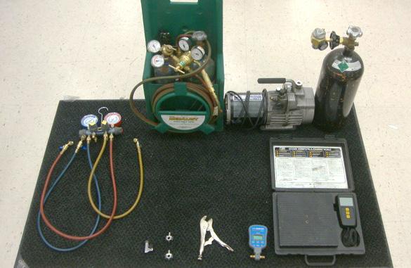 TOOLS TOOLS USED FOR ALL SYSTEMS INCLUDING HC/R-290 1. Torches 2. Manifold set 3. Vaccuum pump 4.
