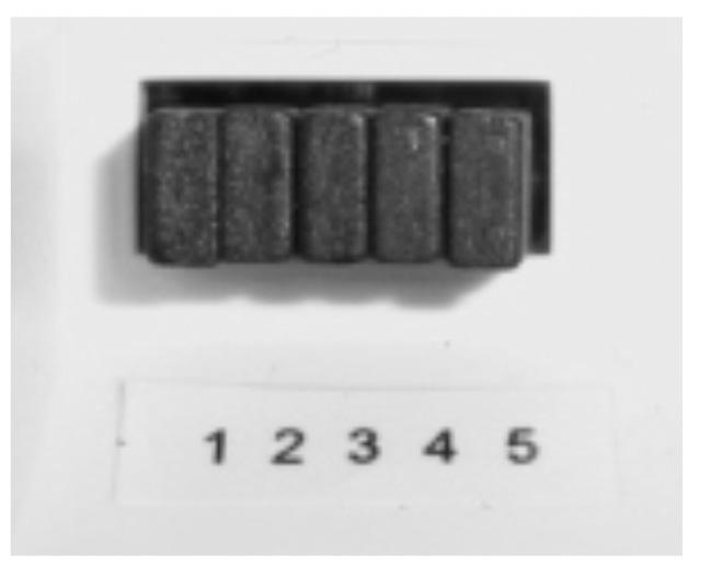 To adjust the RF address code of the Control Centre, remove one or more of the jumper caps located on the back of the unit (labelled 1,2,3,4 and 5, and shown in the picture below) so that the jumper
