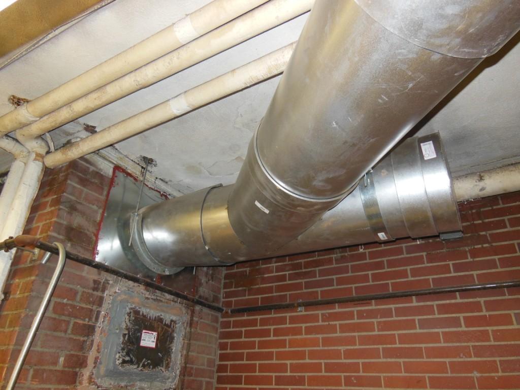 Stainless steel flue vent piping from Boiler B-1 reconnect to