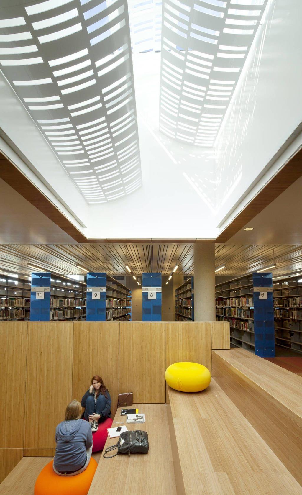 Once inside, there is a natural organization to the various library sections created by the layering of quiet, collaborative, social and private zones of the floor