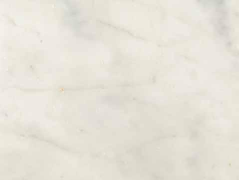 WHITE Subtly charming Topaz White marble stands out with a lucid white to yellowish-white