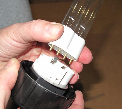 Now you can remove the 18 Watt PL-L UV bulb. (FIG. 17.4) 7. Put a new 18 W PL-L UV bulb in the four pin socket. You do not need to replace the transit clip as it is no longer needed. (FIG. 17.4) 8.