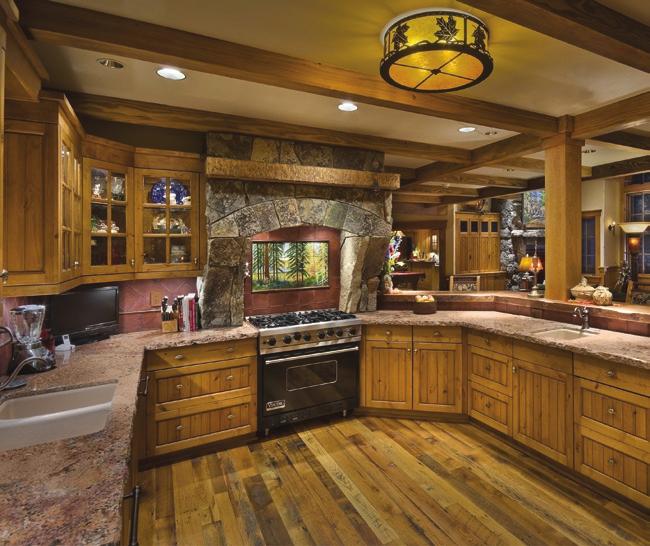 (above) The spacious kitchen, which opens out to the great room, is finished with knotty
