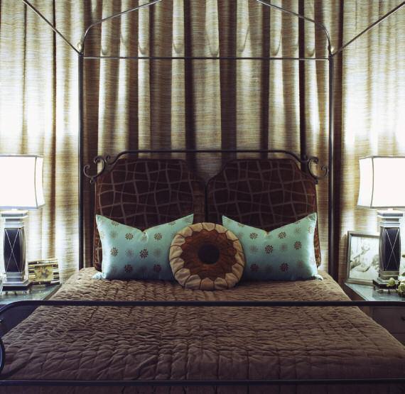 THIS PAGE: Neutral tones are enlivened by the turquoise throw pillows in this narrow bedroom.