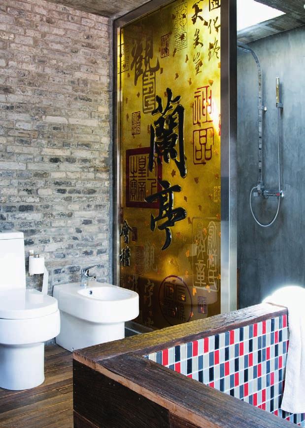 i wanted to introduce some red into the bathroom because it is a lucky colour in China Main bathroom The main bathroom at the top of the house has a huge bespoke bathtub