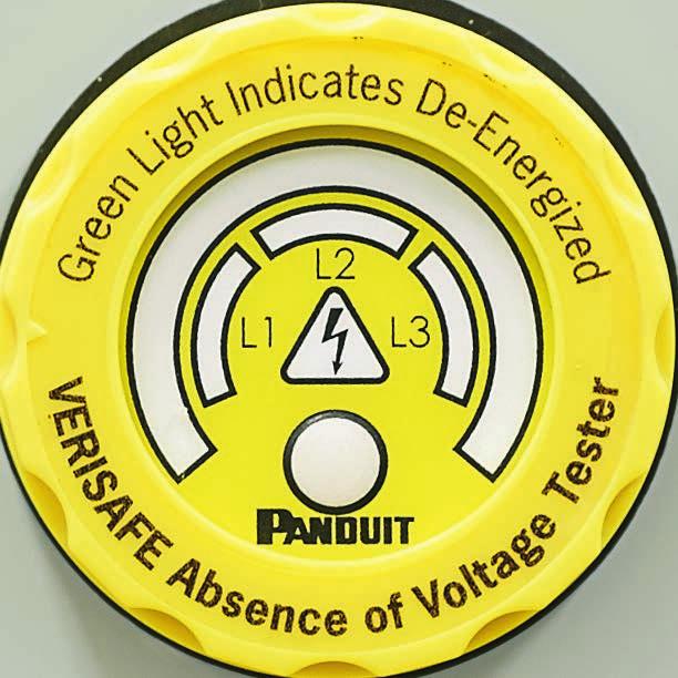 enclosure containing electrical conductors and circuit parts. RED indicators illuminate when hazardous AC voltage is present.