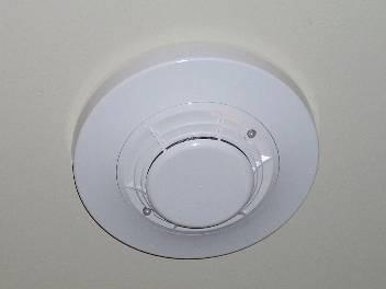 Image 4 Smoke Detector The alarm system can be manually activated by initiating the pull stations located at exits