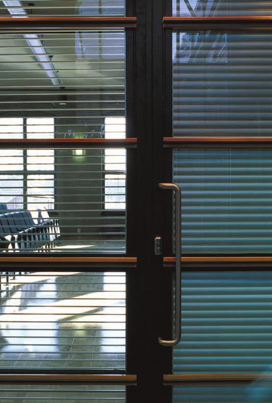 INTEGRATED LOUVERS in Doors and Openings FOR VISION AND DAYLIGHT CONTROL By Jean-Francois Couturier Integrated louvers can be used in classroom doors for adjustable visibility and sound attenuation.