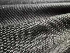 Figure 13. Woven multi-filament geotextile with close-up Woven geotextiles Woven geotextiles are manufactured from various polymers with increasing strengths typically increasing their cost.