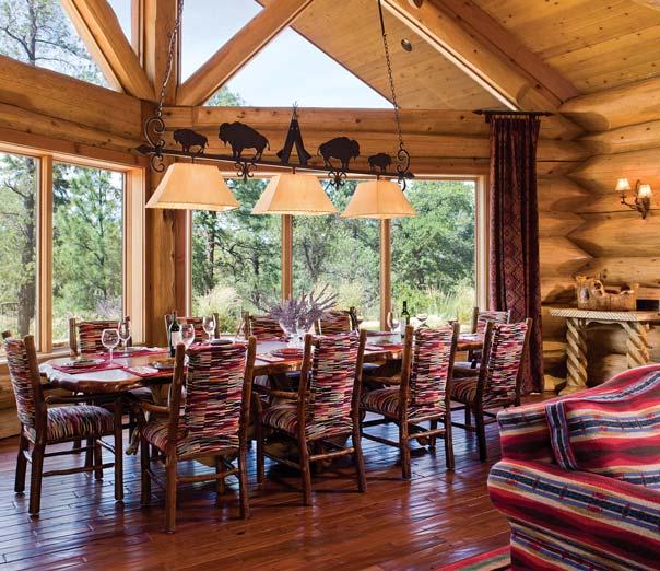 Interior designer Rochelle Rubin coordinated other colors and fabrics with the art. Tim Donmoyer recalls dreaming of building a log home since he was a kid playing with Lincoln Logs.