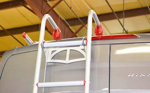 Shown with Ladder properly mounted on rail at driver side rear Ladder Lock Knob 2. Lift ladder from storage rungs. 4.