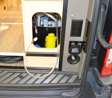 SECTION 7 PLUMBING Water Pump (Located beneath passenger side dinette cabinet at rear - open rear doors to access) COLD WATER FILTER If Equipped To obtain filtered cold water for drinking or cooking,