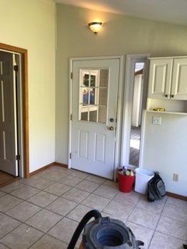 1. Conditions Entryway Ceiling and walls are in good condition overall. Light fixture operates. Entry door operates and locks overall. Tile floor is in good condition.