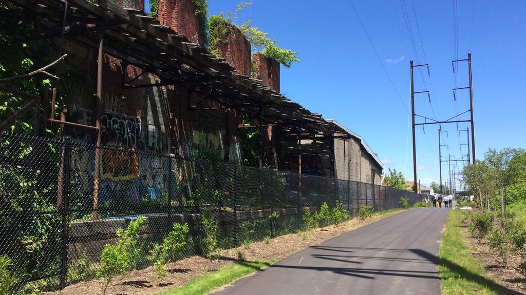 Through much of the Greenway corridor, active and vacant industrial sites still dominate the area between Interstate 95 and the riverfront in