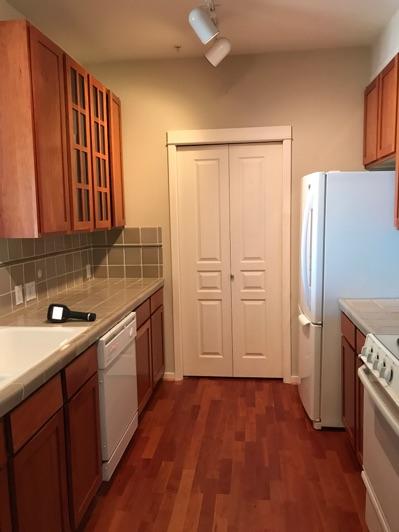 1. Kitchen Room Kitchen Walls and ceilings appear in good condition overall. Flooring is Engineered wood. Accessible outlets operate. Light fixture operates.