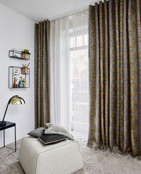 Opaque and softly flowing, this lively patterned fabric features seven colours: silver, ochre, taupe, green, blue and, for a modern contrast, slate against