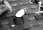 Lift asphalt shingles and place roof jack assembly under shingles. Seal underside of roof jack and nail into place.