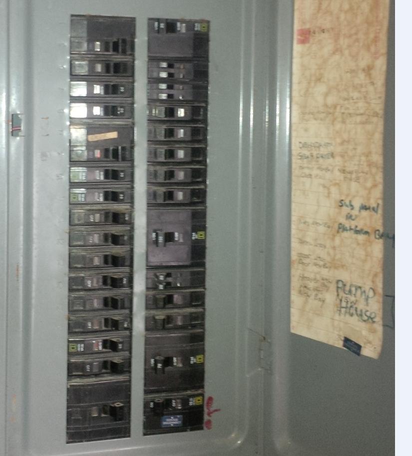 Killington Fire Station Feasibility Study Electrical Assessment Figure #1 Main Panel full with mini-breakers and poor labelling condition.