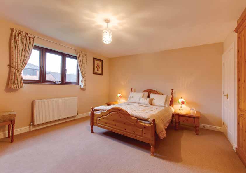 8m) A spacious and light room with a front facing UPVC double glazed window with granite sill,