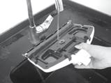 the appliance. 2. Wash bottom of foot and bristles with cold water. 3. Look for any clogging in the steam nozzle.