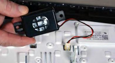 These parts must be moved over to the new service replacement part. 9. Using a T-20 TORX driver, remove the screw securing the UI harness to the upper lid assembly (location circled in Figure 2). 10.