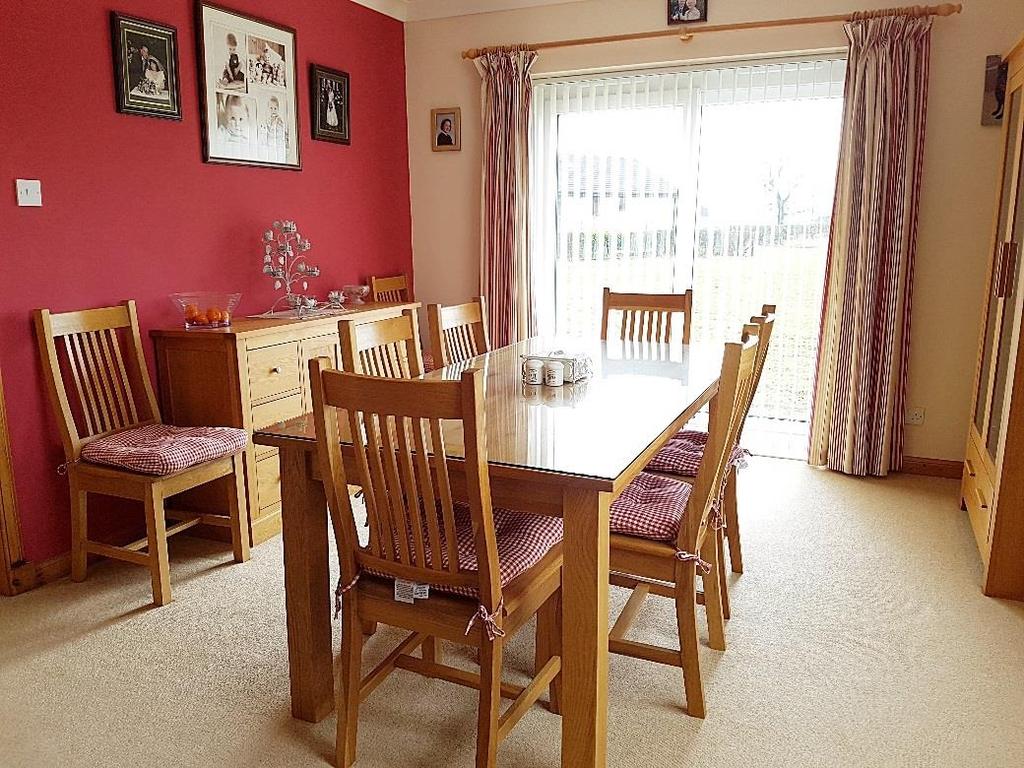 DINING ROOM Spacious and bright with patio doors leading to rear and window to side both fitted with blinds and curtain poles and offers great views out over the surrounding countryside and beyond,