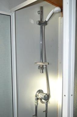 thermostatic shower and glazed door.