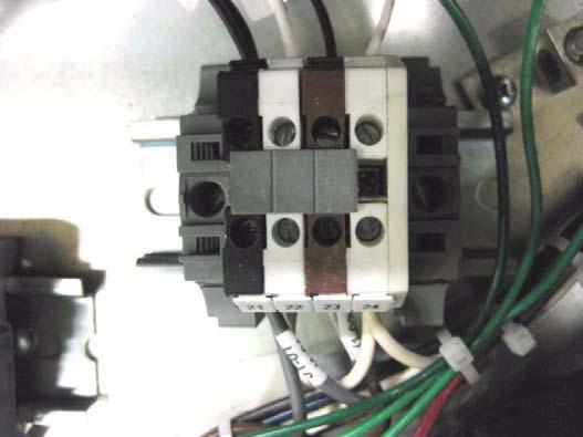Strip the insulation off both ends of each wire. Attach one wire between terminals 10 and 11. Attach the other wire between terminals 5 and 6. 2.