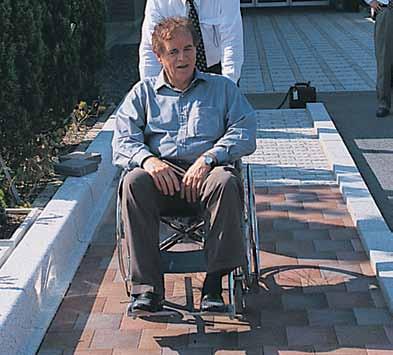 Paving units can be selected that reduce wheelchair vibrations to less than that from conventional concrete.