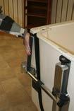 Carrier Latch Pin Release Lever Close The Tub Door: Lower the leg rest by lifting on