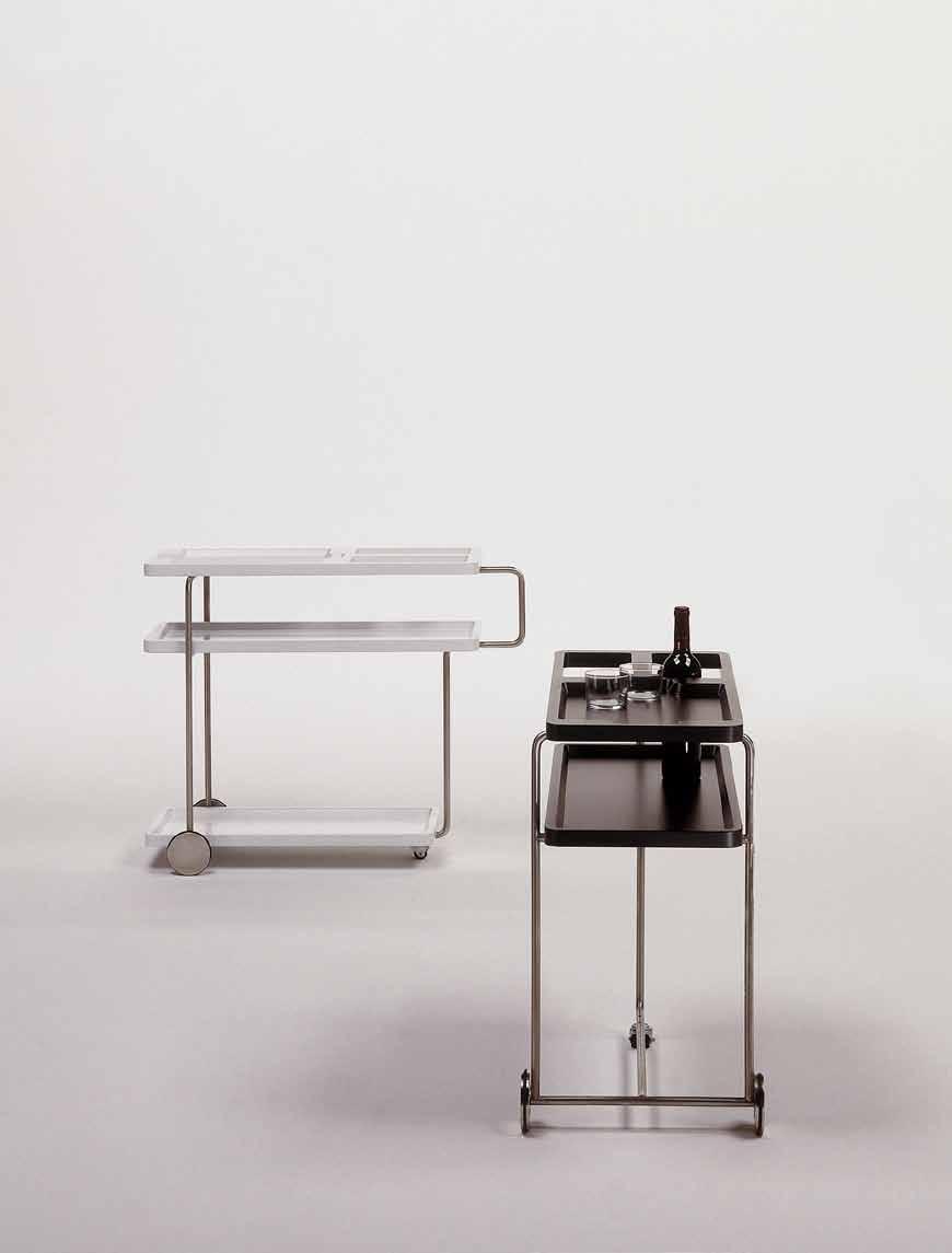 A stool to put personal items on, a central table with a whole in the center, another with a rotating surface which opens