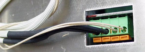 3 In the same manner, connect the Delta PRT leads to the two right-most positions in the connector block. Polarity does not matter.