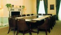 Laid out in boardroom style with ample seating for 16 people, it is