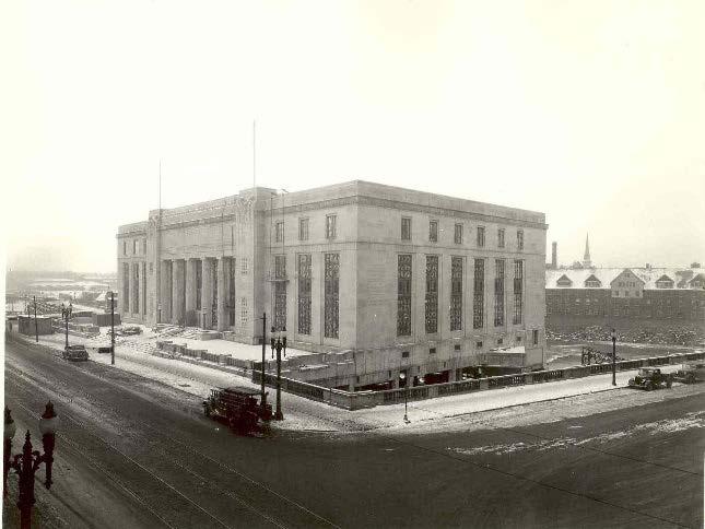 SITE HISTORY The Rundel Library, a three story, 120,000 square foot facility, adjacent to the Genesee River and to the historic second Erie Canal aqueduct, was completed in 1936 as a Federal Works