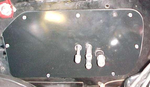 NEXT STEP SHOWN FROM THE ENGINE SIDE UPPER MOUNTING STUD Place evaporator on the floor of the vehicle.