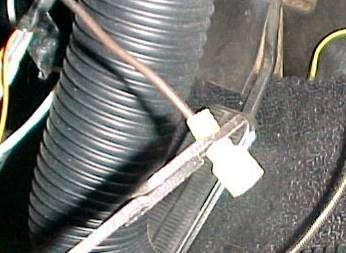 Attach a Male spade connector to the brown wire as shown.