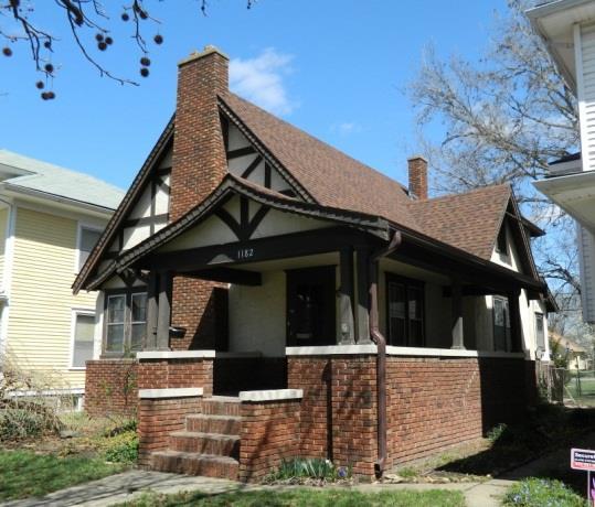 Architectural Description: Dutch Colonial Revival homes are usually 1 ½ to 2 stories in height, with a distinguished shed, hipped, or gambrel roof, sometimes seen with flared eaves.