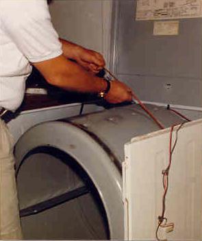 As the dryer ages, that bearing will seize, and begin to make unusual noises. It is necessary to remove the top, the front, and the basket to access the fan hub.