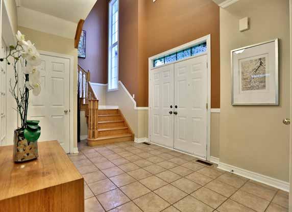 PROPERTY DETAILS main Level Foyer Double doors with transom open to the bright 2-storey foyer Nine foot main floor ceilings Upgraded semi-flush light fixtures with antique iron trim Beautiful natural