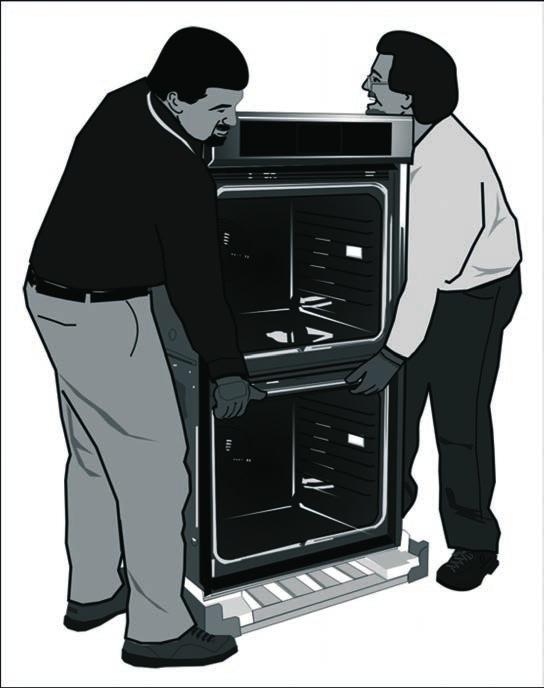 The unit and its bottom packaging (pallet) should be positioned close to and in front of the cabinet opening prior to beginning to lift the unit into place.
