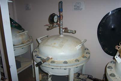 four identical pressure vessels with readout boxes Fig. 1.