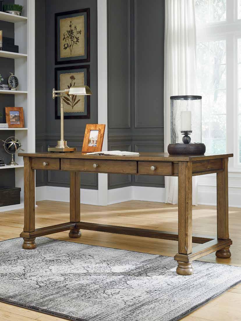 FLYNNTER Sporting a handsome, hearty profile and complex chestnut-tone finish, the Flynnter home office desk brings home a richly rustic style that s warm and welcoming.