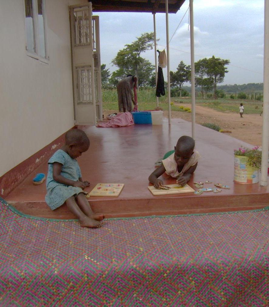 When we arrived the children had started their Christmas holiday. Here is Little Bena and Gloria engaged in Puzzles.