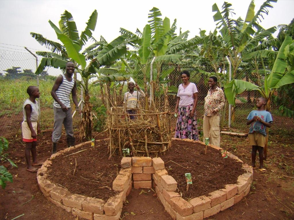 The oldest three children planted up the first keyhole garden, Bena, Joseph and Yassin.