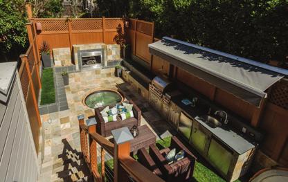 The BACKYARD/GARDEN features a closet for storage, illumination, large tiled patio, tiled sitting areas around the patio, hot tub, two built-in speakers, and two fountains flanking the gas