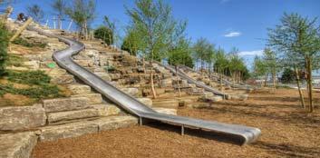 THE HILLSIDE SLIDES & STONE STEPPERS $100,000 Artist s Rendering of the Sunshine Playscape Hillside Slides A man-made hill