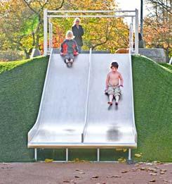 Kids can opt to run up the hill to get to the top of the slides or climb up on a cluster of natural limestone stones.