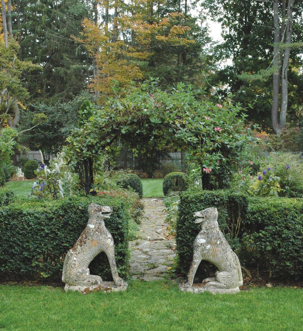 April 10, 2015 Antiques and The Arts Weekly 41 An important pair of carved Bath stone armorial hounds in the naive style, with heads raised and mouths agape, with fur, collars, and chains