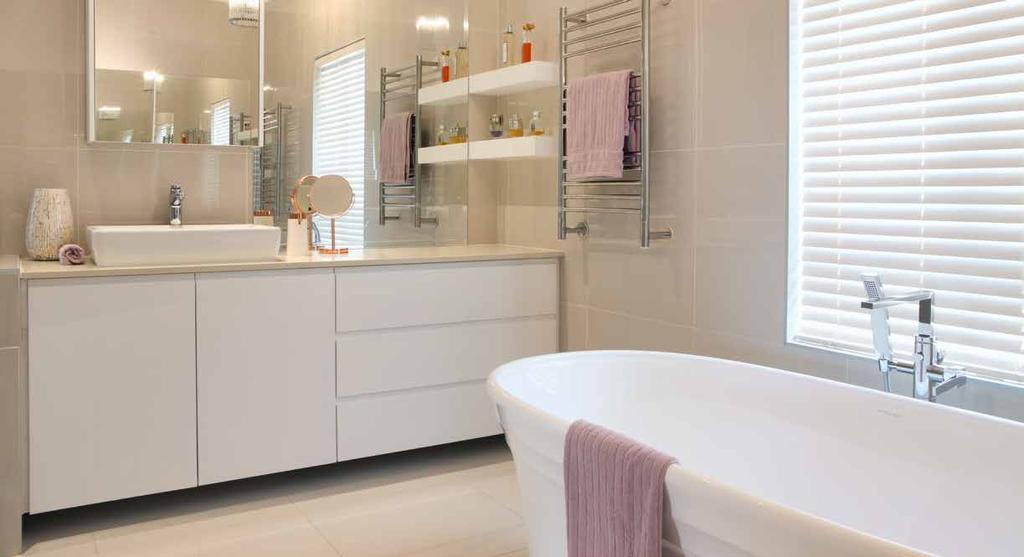 HOME FEATURE Laufen Basin, Jeeves heated towel rail, Arezzo Free Standing bath mixer May and Brandon Lourens have